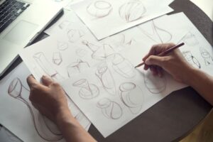 Production designer sketching Drawing Development Design product packaging prototype idea Creative Concept